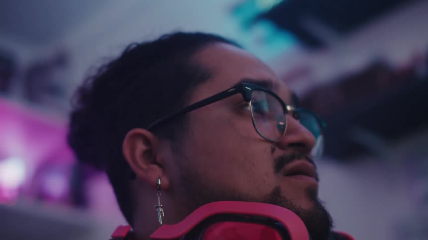 A man is upset at something he is watching