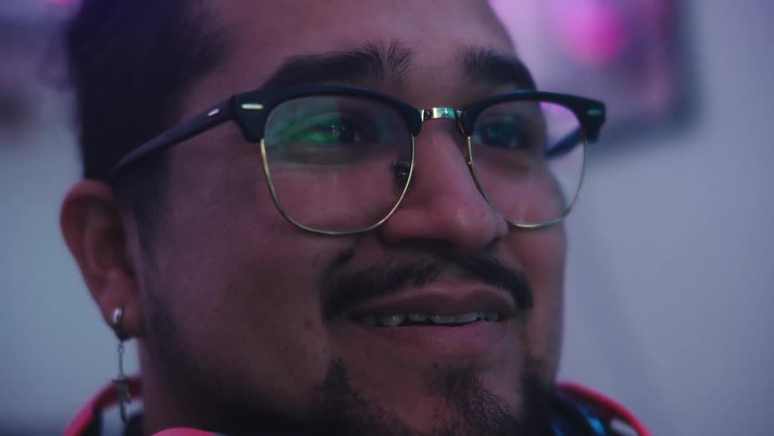 Portrait of a smiling man with glasses