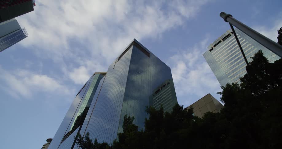 Skyscraper buildings stand tall in an urban city