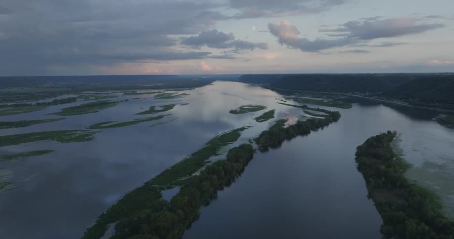Aerial view of a river with forested banks