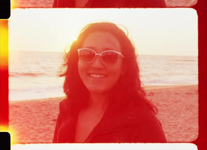 Portrait of a woman with sunglasses on the beach
