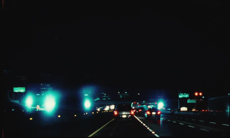 Vehicle traffic on a highway at night