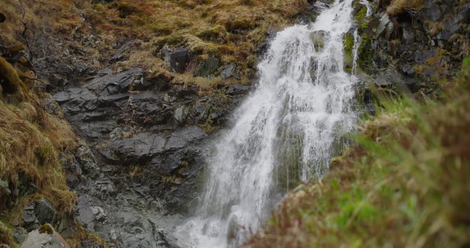 Flowing water of a waterfall