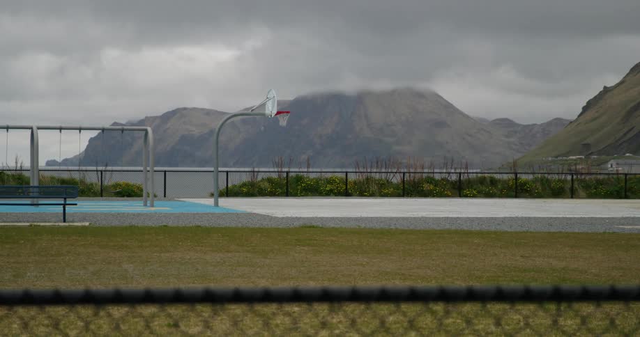 A playground is by the mountains