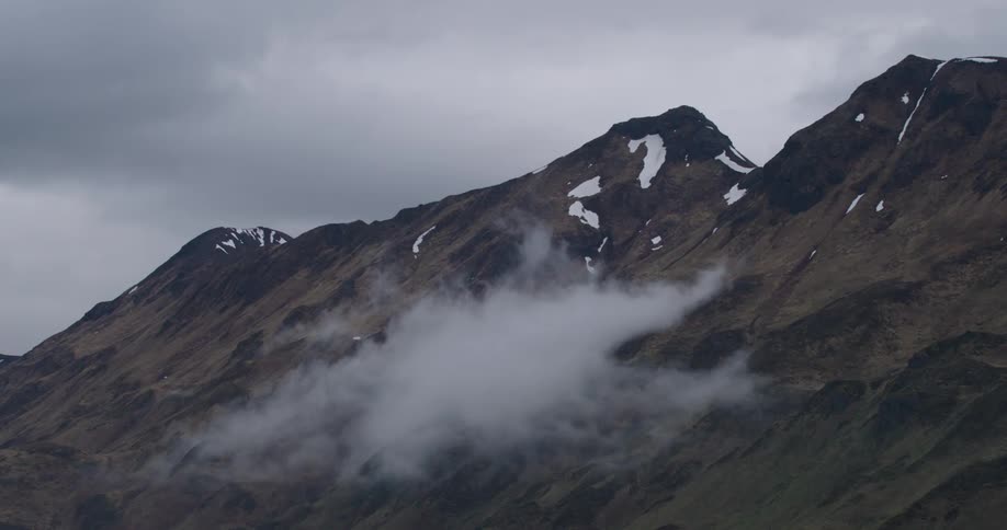 Snowy mountains and a cloudy day