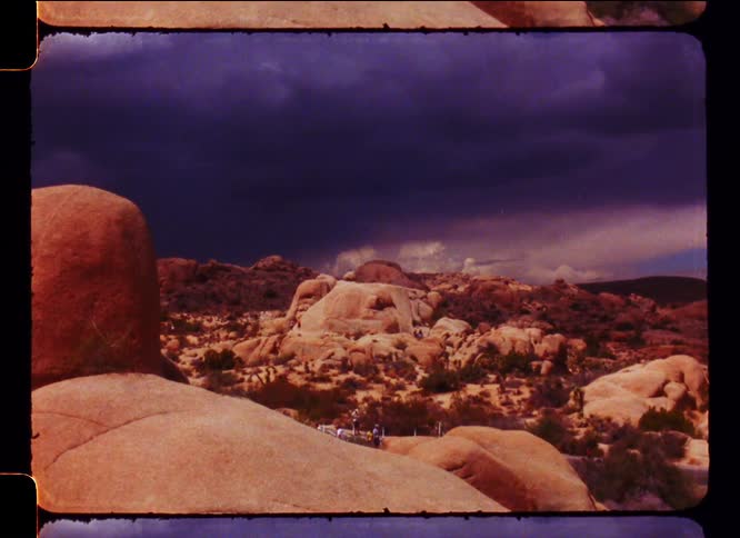A clip of hikers on a rocky area
