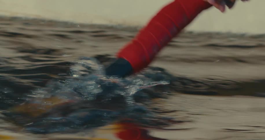 Canoe boat moving through the sea