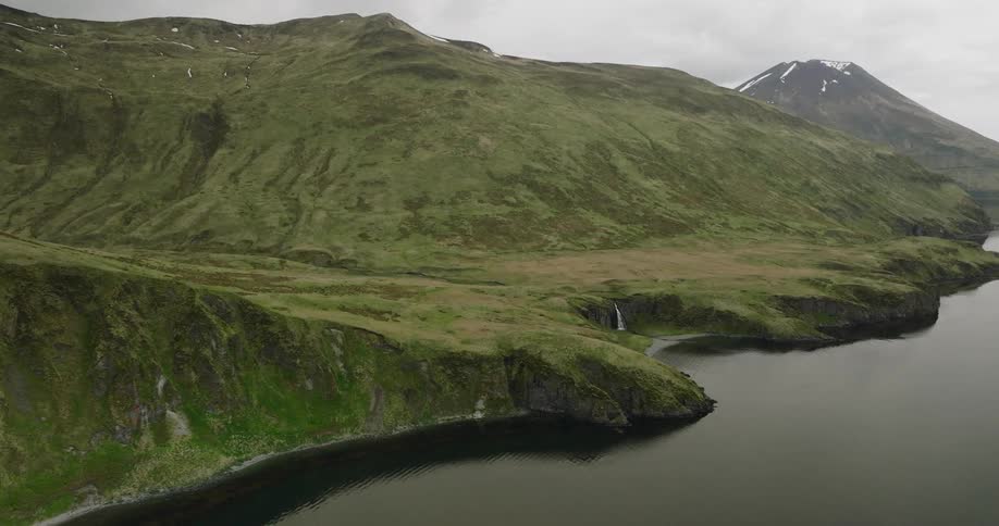 Alaskan mountains with waterfall