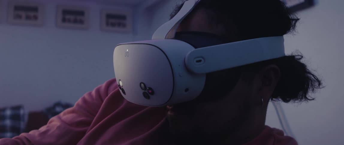 A person is wearing a white vr headset