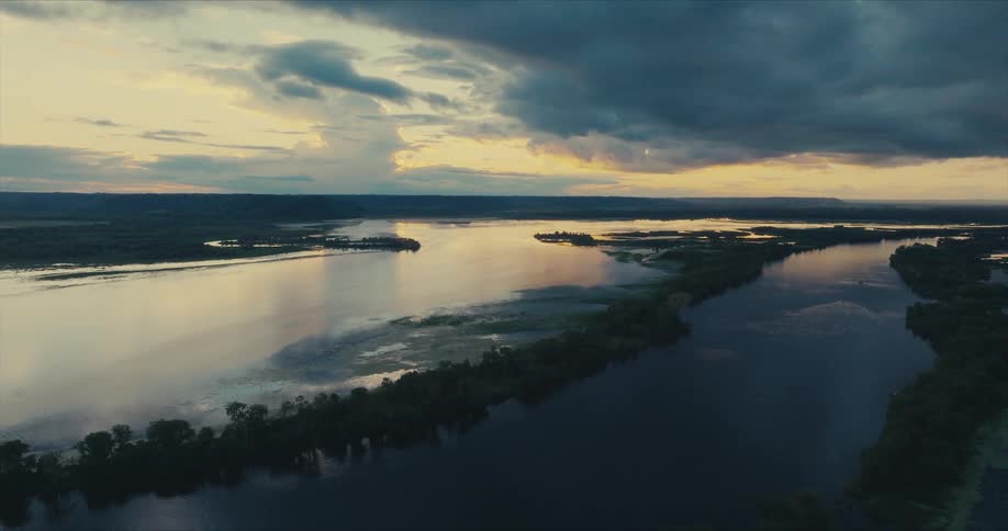The sun is rising on the long river