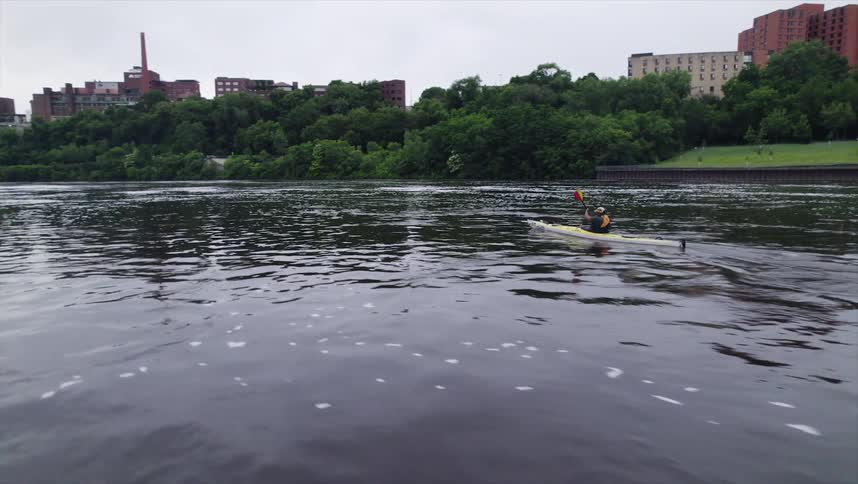 A clip of a person kayaking the river