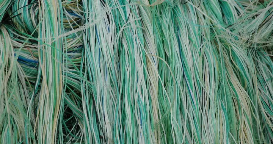 Drying fishing nets in a pile