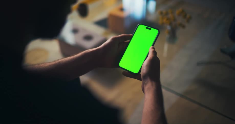 Pair of hands interacting with a smartphone
