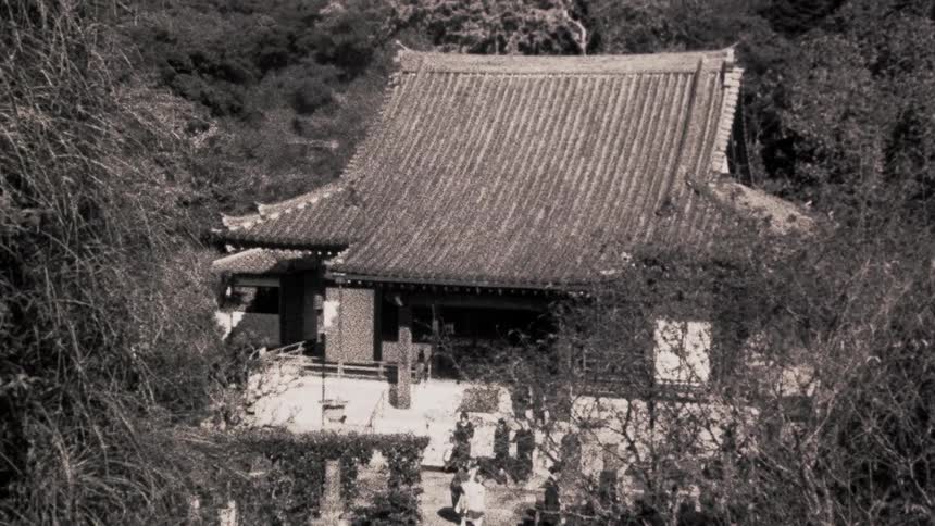 People walking in an asian temple