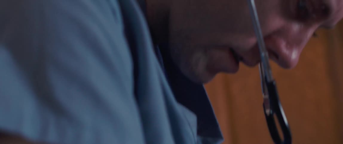 A doctor is examining a patient and checking a device