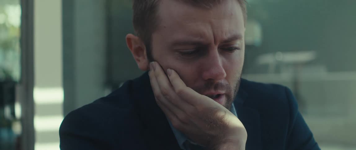 Man putting his hand on his chin in disbelief