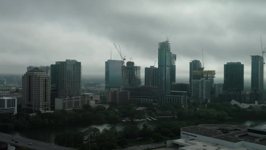 City skyline with multiple highrise buildings under construction
