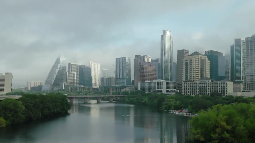 Panorama of a river on the edge of a metropolis with modern buildings