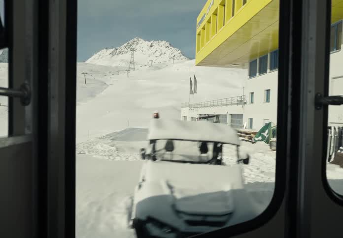 Moving view of a cable car going up a mountain