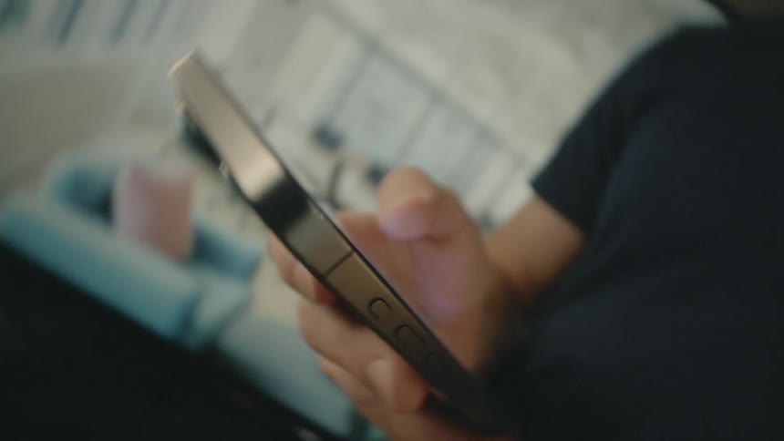 A clip of a person operating a phone