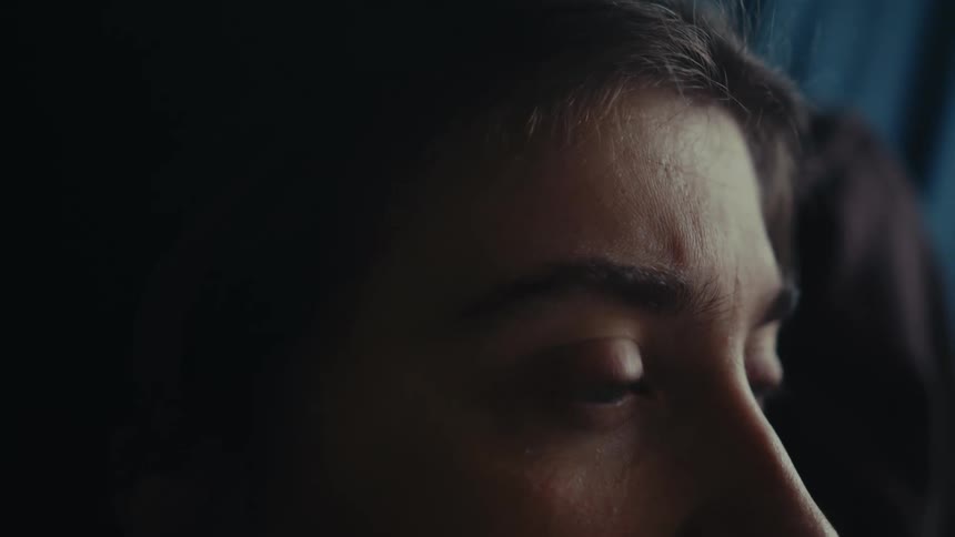 A close up clip of a ladys face