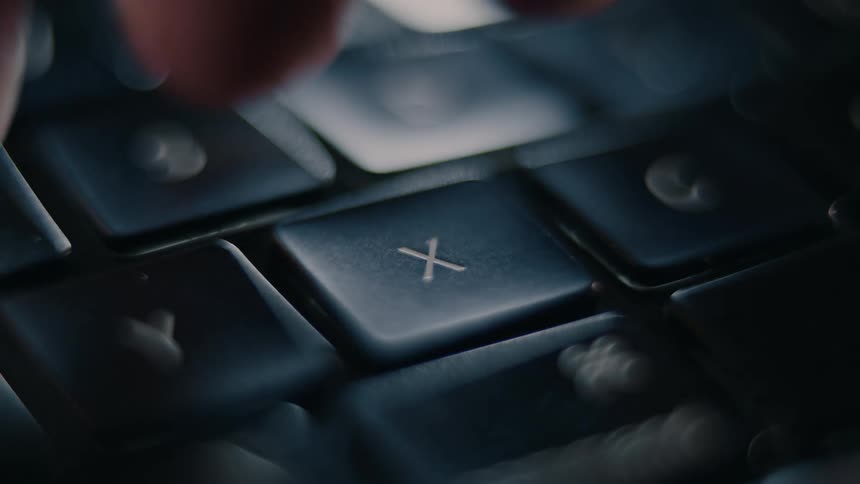 Index finger clicking a key