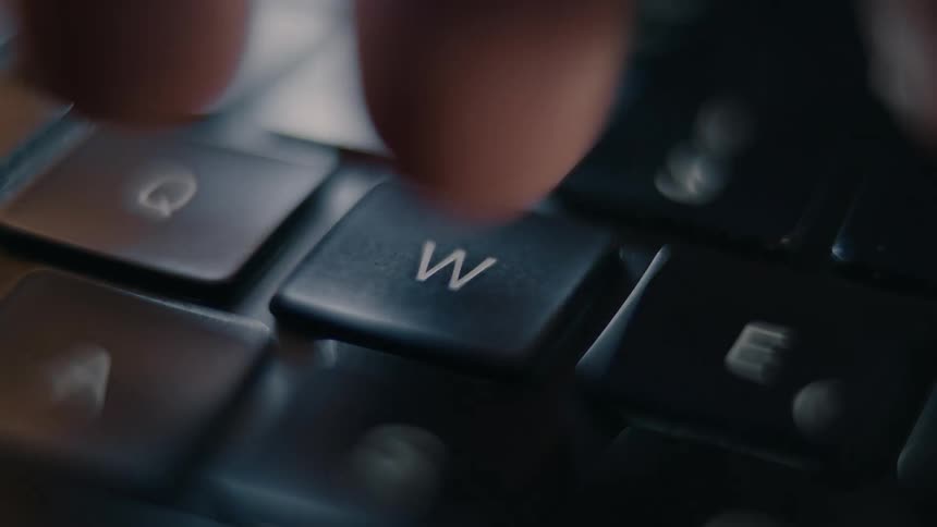 A close up clip of a person typing