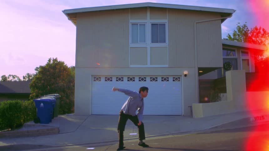 A man is dancing in the street