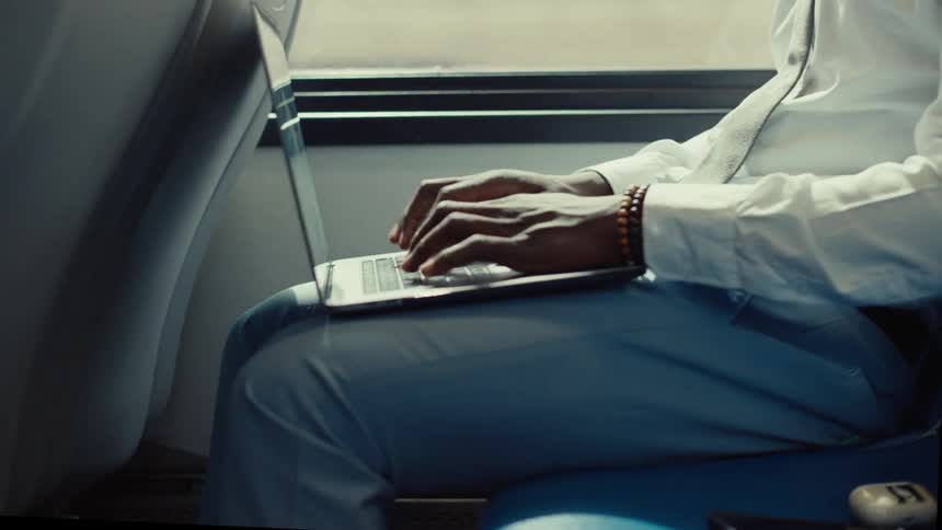 A clip of a person typing on a laptop