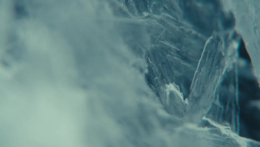 Detailed ice crystals with angular shapes and a complex texture