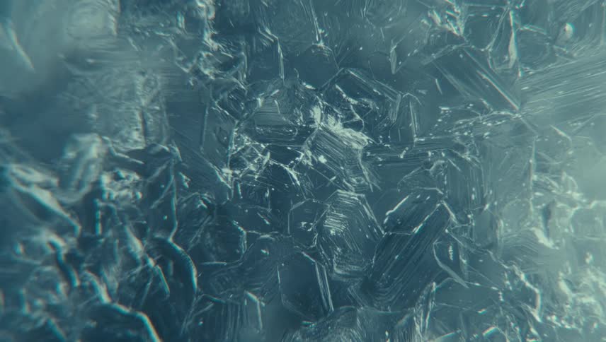 A closeup view of intricate ice crystal formations with detailed sharp lines and textures