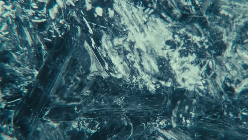 Extreme close up of ice with water inside