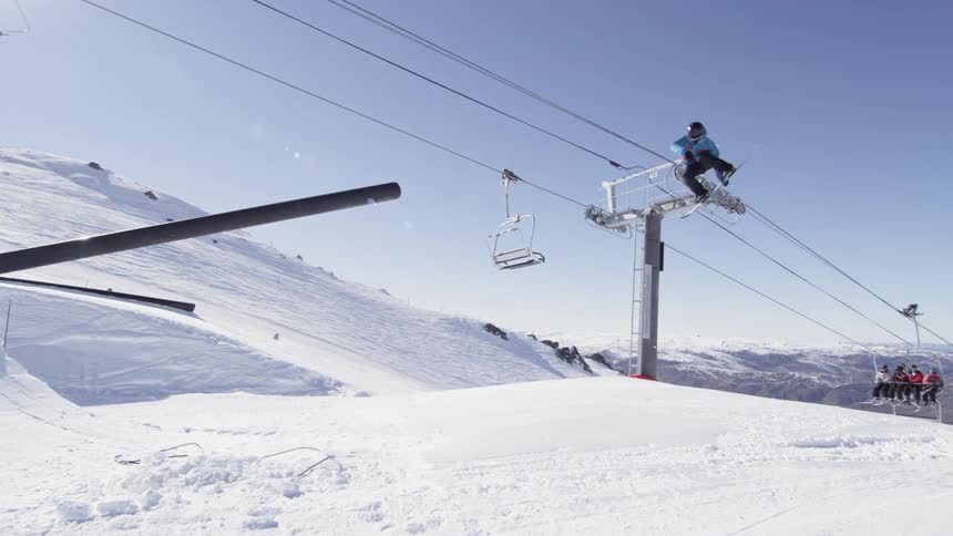 People ski and ride the lift