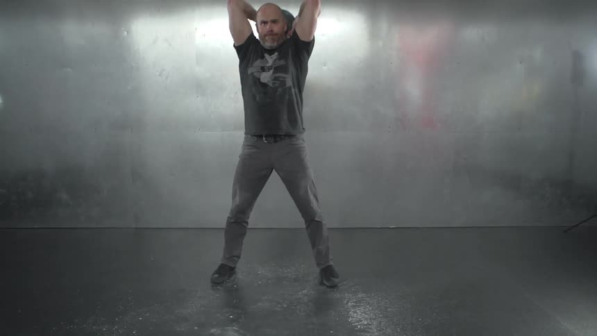 Man slamming medicine ball