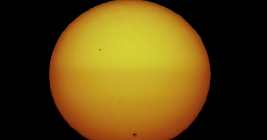 Closeup of the sun with its bright yellow surface