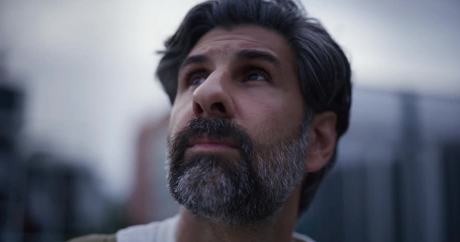 Portrait of a bearded man looking to the side