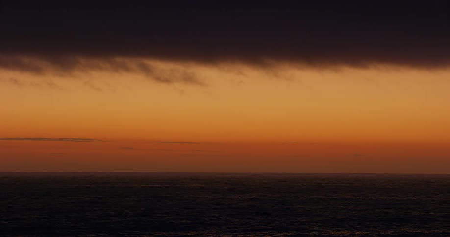The sky is orange at sunrise