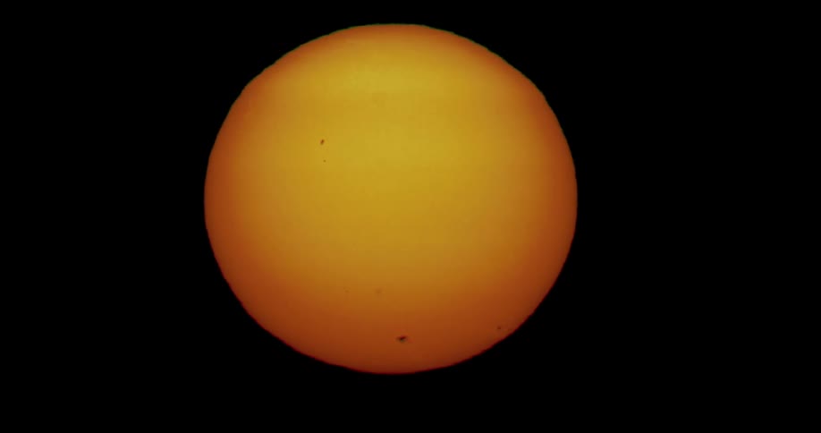 The sun is orange at dawn