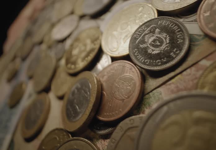 A clip of coins on the table