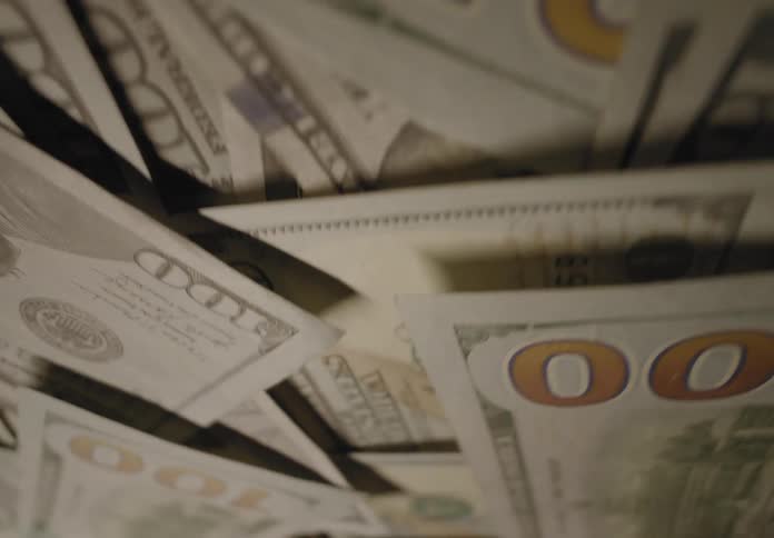A clip of dollar cash