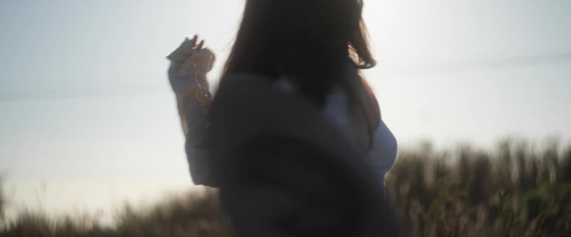 An image of a lady spinning around