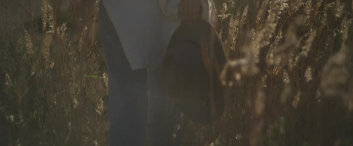 A clip of a person walking in the bush path