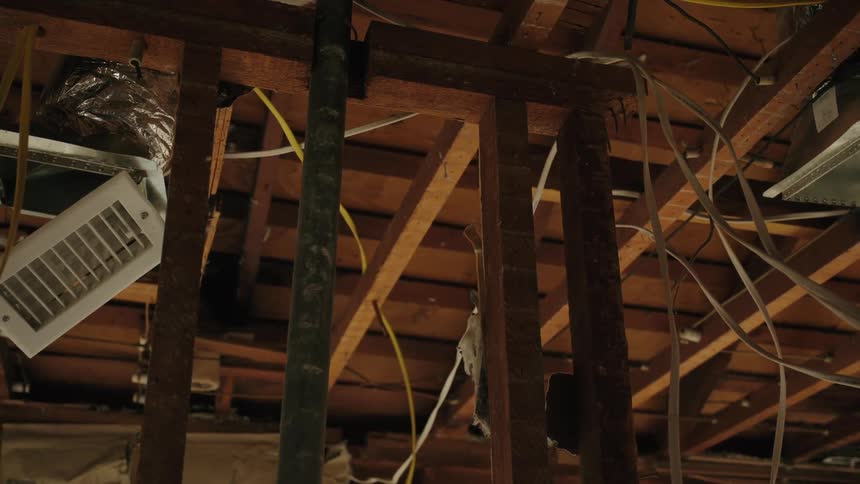 Unfinished House Ceiling with Wood Exposed and Wires