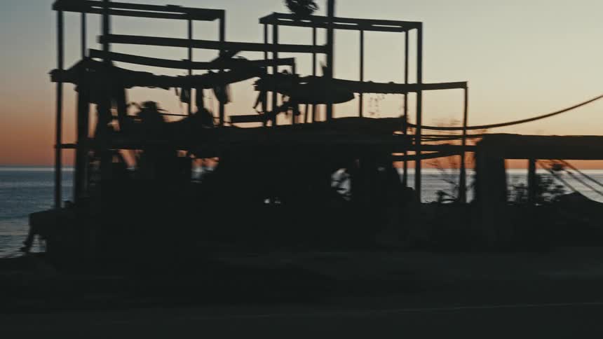 The structure is burned down on the beach