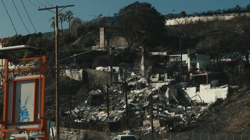 A home on the hill has collapsed in a landslide