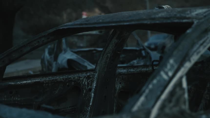 A clip of a ruined car