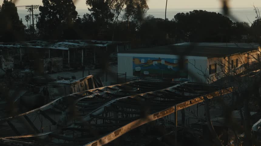 The trailers are burned down in the lot