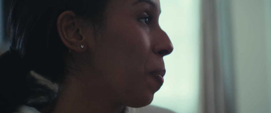 Side portrait of a woman talking