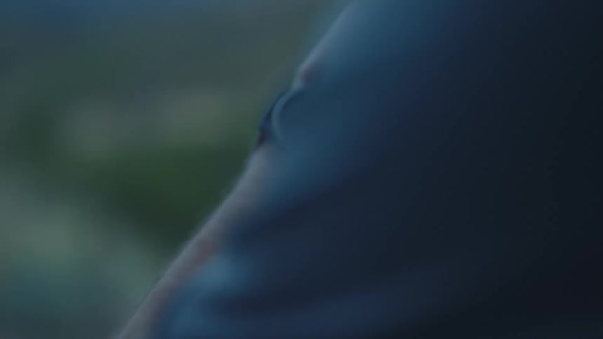 Close up of a mans arm setting a watch