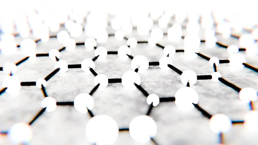Closeup of a net made of white beads and black line